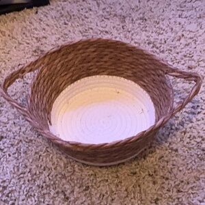 Tan and White Woven Basket with Intricate Design